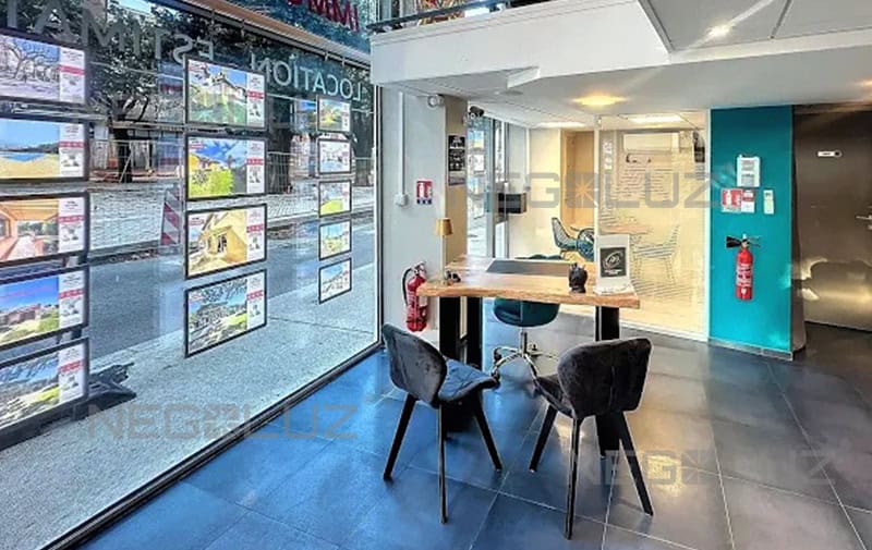 backlit poster display for real estate agent
